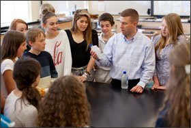Teacher Chris Merkert performs a supercooled-water experiment during an 8th grade earth science class in East Hampton, N.Y. He says digital tools help free up more class time for experiments.