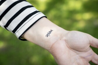 Amanda Jones, 44, got a tattoo that says "moxie" after Newbury Award winning author Erin Entrada Kelly used the term to describe Jones and her legal battle against conservative activists.