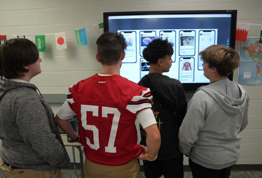 Social Studies teacher Simon Sharick supervises students at the Plymouth High School in Ohio on how to properly prompt the Gemini Ai App to get their desired information. Students were using the Gemini App for the first time on Friday, Aug. 28, 2026.