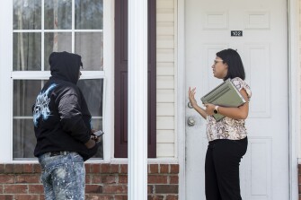 Janell Reyes talks with Daquan Wallace, 18, a senior student at Lowcountry Acceleration Academy, when visiting to perform a check-up on Wallace and his plans to make classes in North Charleston on Tuesday, August 9, 2022. Wallace noted how working two part time jobs had his schedule tight but would work with Reyes to finish his senior year.