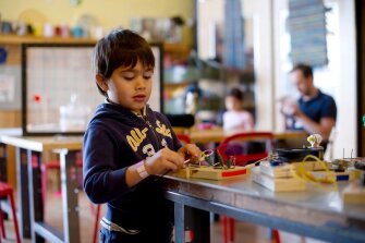 Abdullah Haseeb, 4, works with “circuit blocks” in the MakeShop at the Pittsburgh Children’s Museum. The blocks are the result of a collaboration between a local teacher, a resident artist, and a robotics lab at Carnegie Mellon University.