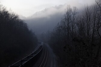 Coal cars sit empty on the tracks in McDowell County. The once-thriving coal-mining area has seen a dramatic decline in population in recent decades.