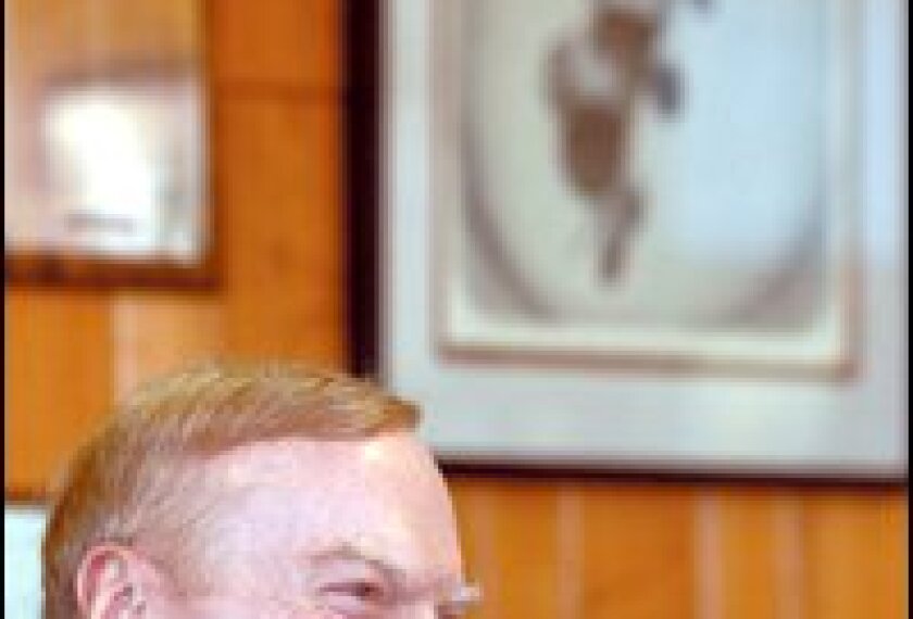 Retired Air Force major general, John G. Fryer in his office.