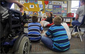 Greta Smith reads to her special education class at Buhler Grade School in Buhler, Kan.