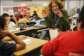 ESL teacher Kristin Yoder Kauffman explains the word "shuddering" to 4th and 5th graders during their two-hour reading class at Virginia's Waterman Elementary School, in Harrisonburg.