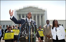 Ryan P. Haygood, a political director with the NAACP legal Defense and Educational Fund, speaks outside the U.S. Supreme Court last month, criticizing the court's ruling in a voting-rights case. The court ruled that a key provision of the Voting Rights Act cannot be enforced until Congress crafts a new way of determining which states and jurisdictions will require federal approval to make voting-related changes.
