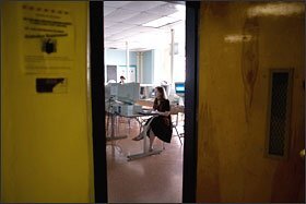Ms. Zahrt works in the computer lab of the Academy for College and Career Exploration during an after-school program she oversees that allows students to make up course credits online.