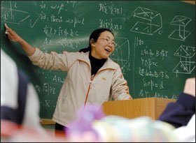 Zhao Jing teaches a morning math class at the Beijing Fourth Secondary School in Beijing. The men and women who go into the profession in China say they do so because teaching brings them stability and respect.