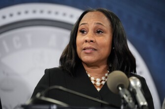 Fulton County District Attorney Fani Willis speaks in the Fulton County Government Center during a news conference on Aug. 14, 2023, in Atlanta. Donald Trump and several allies have been indicted in Georgia over efforts to overturn his 2020 election loss in the state.
