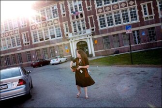 Ms. Zahrt walks to her car at the end of a day crammed with duties typical of teachers at the new small public high schools being created in many urban districts in the hope of raising achievement and graduation rates.
