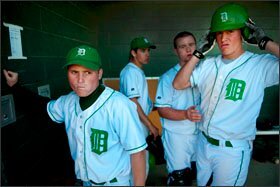 High school baseball players from Dixon, Calif., wait in their dugout between innings during a game on March 11; from left, the students are Donovan Wilson, Gabe Gonzalez, Zach Kalish, and Bryan MacHovec.