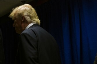 Republican Presidential candidate Donald Trump arrives at the Quicken Loans Arena Wednesday evening.