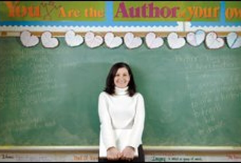 Philadelphia teacher Mary Rooney Thorp uses her laptop computer to mine her 8th graders' test data for clues on adjusting her instruction, and then to find resources for doing so.