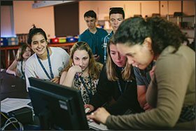 From left to right, Torres and classmates Erin Collins, of Philadelphia, and Winnie Litchfield, of Atlanta, listen to instructions for an astronomy assignment at the University of Notre Dame.