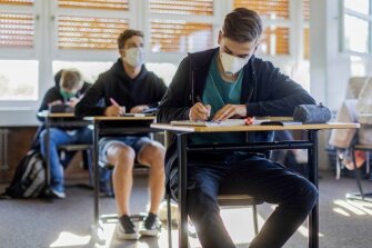 Students prepare for end-of-year examinations at the Joseph Koenig Grammar School in Haltern am See, Germany, Thursday, April 23, 2020. Almost six weeks after the closure of schools in North Rhine-Westphalia due to the coronavirus crisis, many of them are now opening their doors again for the first time for thousands of exam candidates.