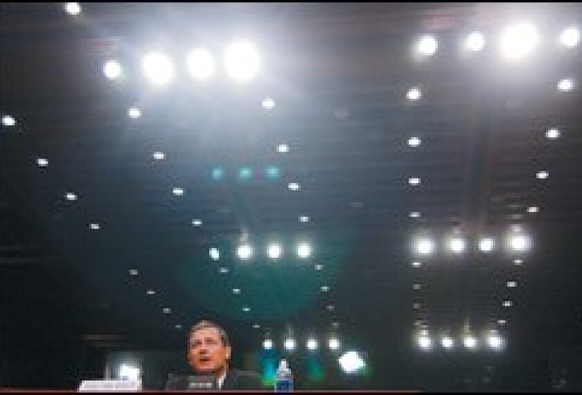 Judge John G. Roberts Jr. responds to a question from Sen. Edward M. Kennedy, D-Mass., about civil rights on Sept. 12 during his confirmation hearing before the Senate Judiciary Committee.