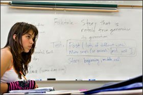 Alice Morgenva, who speaks Russian and parts of three other languages, works on a writing assignment during Brian Squire's class at Westview High School in Portland, Oregon. A state ballot measure would put strict limits on non-English instruction.