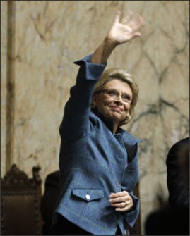 Washington Gov. Christine Gregoire waves to the upper gallery in the House chamber following her annual State of the State address to a joint session of the state legislature in Olympia last week. She is seeking a temporary sales-tax hike to aid education.
