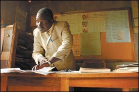 As the recently appointed headmaster of Nkumari Primary School in Kenya's Meru district, Peter K. Inoti has had to balance a full class load with new responsibilities, including government-mandated accounting for supplies and improving scores on standardized tests.