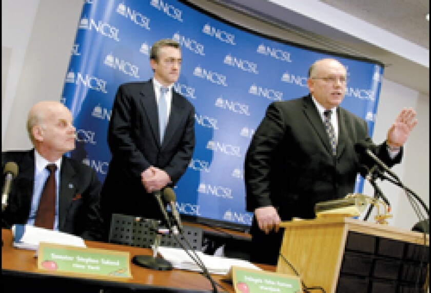 From left, New York state Sen. Steven M. Saland, Maryland Delegate John A. Hurson, and Utah Rep. Kory M. Holdaway release a National Conference of State Legislatures report on the "No Child" law.