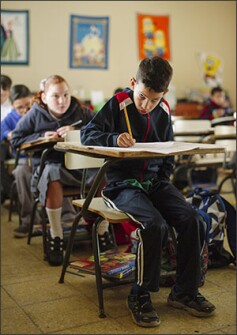Fourth grader Edgardo Virella Colón works in a classroom at Jaime Coira School in Ciales, Puerto Rico.