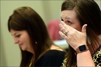 Mississippi teacher Casey Watts cries during a training session after realizing how difficult it is for some students to learn to read.