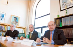 School trustees participate in a board meeting.