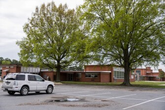 Karen Ruark, a third-grade teacher in Dorchester County, parks outside her elementary school, South Dorchester School, to take advantage of the school’s WiFi hotspot during the hours she’s teaching.