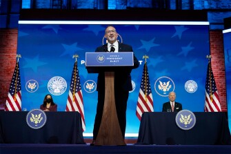 Miguel Cardona, President-elect Joe Biden's nominee for Secretary of Education, speaks after being introduced at The Queen Theater in Wilmington, Del., Wednesday, Dec. 23, 2020, as Biden, right, and Vice President-elect Kamala Harris, look on.