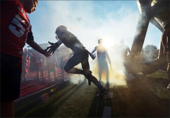 Lakeshore High School football players take the field for a football game in September at Lakeshore High School in Stevensville, Mich.