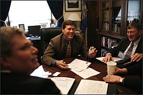 Rep. Ron Kind, D-Wis., center, meets with Wisconsin Association of School Boards members Timothy R. Sivertson, left, and Sid Bjorkman to discuss the No Child Left Behind Act.
