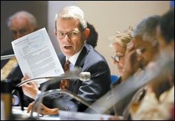 Superintendent Thomas W. Payzant makes a point during a May 24 meeting of the Boston School Committee. He is retiring at the end of this month.