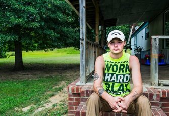 Trey Clayton, 19, sits on his porch in Sarah, Miss. A school paddling in 2011 led to serious injuries for Clayton, who now says, “I do believe in discipline, but I believe there’s certain things you can take to prevent stuff like that happening.”