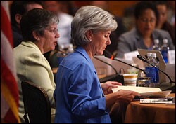 Arizona Gov. Janet Napolitano, left, and Kansas Gov. Kathleen Sebelius, center, take part in a meeting to launch the National Governors Association's "Innovation America" initiative.