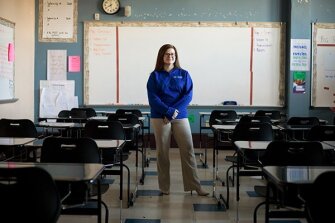 Math teacher Jill Ruby, one of the academic coaches in the AAA Pathways program at Hughes STEM High School in Cincinnati, has a caseload of about 30 athletes whose grades and attendance patterns she checks weekly.