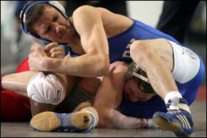 Tournament wrestlers grappling for successs.