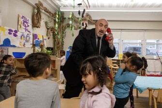Richard Tomko, Superintendent of Belleville Public Schools in Belleville, N.J., entertains students in Ms. Geralyn Latza’s pre-K classroom as they hand him various interactive classroom materials as he makes classroom visits at the Hornblower Early Childhood Center on Tuesday, January 10, 2023. One of Dr. Tomko’s main initiatives as superintendent has been to grow Belleville Public School’s “Preschool Universe,” which has been largely successful since the opening of the Hornblower Early Childhood Center in 2020. District enrollment in the “Preschool Universe” was at 7.8% in the 2018-19 school year, and is now at 86.7% for the 2022-23 school year.