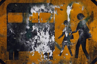 A decayed school crossing sign near Sandy River Middle School in McDowell County.