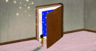 A young child opens a world of literacy in a book