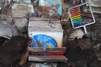 Discarded books and supplies in the vacant Mildred Jackson Elementary School.