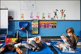 Students in Maciel Martinez’s class read before nap time at the Pre-K Center at Bishop Ford in Brooklyn, N.Y. The city’s expanded public program has tripled the number of prekindergarten seats in two years.