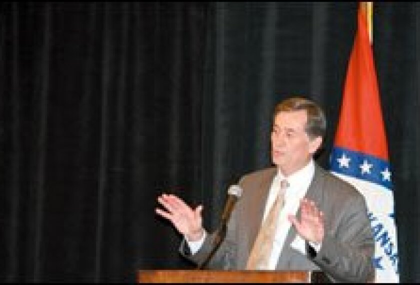 Gene Wilhoit, the executive director of the Council of Chief State School Officers, talks to state education leaders at the council's fall conference in Little Rock, Ark., last month.