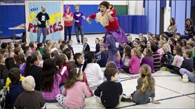 Story Pirates actor Kati Skelton, foreground, performs in front elementary school students during the Little Falls, N.J., workshop in 2012.