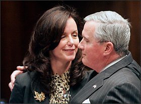 Florida state Sen. Garrett Richter comforts fellow Republican Sen. Lizbeth Benacquisto after the parent-trigger proposal she sponsored was defeated on a tie vote on the last day of the 2012 legislative session. The bill would have let a majority of parents at a school spark a major restructuring, which could have included conversion to a charter.