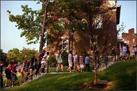 Students walk through campus to a Masquerade Ball event during the Johns Hopkins Center for Talented Youth summer program at Lafayette College in Easton, Pa.