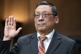 Myong J. Joun, nominee to be U.S. district judge for the District of Massachusetts, is sworn in during his Senate Judiciary Committee confirmation hearing on Tuesday, Nov. 15, 2022.