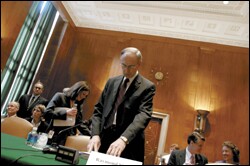 Raymond J. Simon, the U.S. Education Department's assistant secretary for K-12, reviews notes at a Senate hearing on early childhood last week.