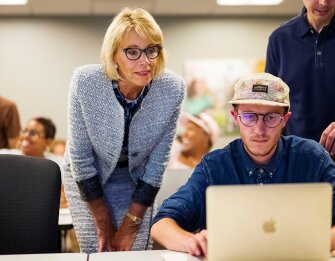 DeVos visits a coding class in Omaha, Neb., during a visit to the Midland University-Omaha Campus.