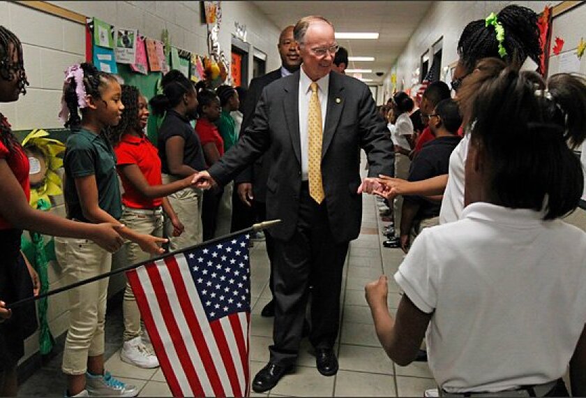 Gov. Robert Bentley is greeted by students at the W.S. Garrett Elementary School on Nov. 1 in Montgomery, Alabama. Bentley and state education officials visited the school to discuss the National Assessment of Educational Progress.