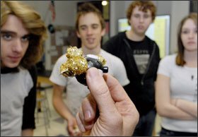 Students in Balet's class examine a nanocell model.